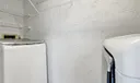 In the storage room on the screened in patio