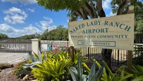 Which Agent in Palm Beach County Specializes in Airfield Communities?