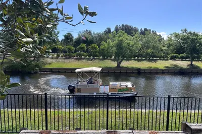 BOAT PASSING BY THIS HOME