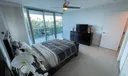 Floor to ceiling glass doors to ample terrace