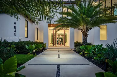 Grand Entry | Pivot Door | Tropical Landscaping |