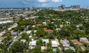 Aerial views of this exquisite villa with private guest house, pool and outdoor amenities to enjoy with family & friends.
