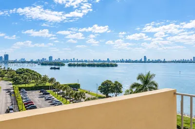 Elevated terrace featuring a metal railing with a
