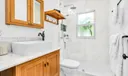 Spacious second bathroom with walk in shower, vessel sink and plenty of counter space on the vanity.