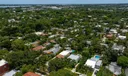Aerial views of this exquisite villa with private guest house, pool and outdoor amenities to enjoy with family & friends.