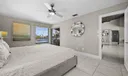 Master bedroom with a sliding door to the Pool