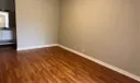 Master bedroom has vaulted ceilings, new laminate flooring and new ceiling fan/light