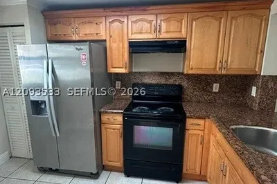 911 NE 209th Ter #102-27 1