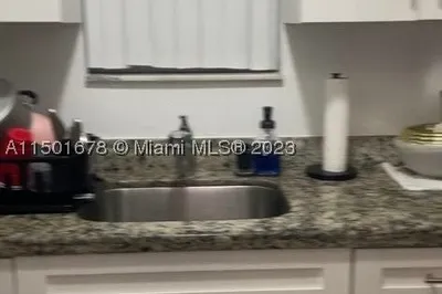 5631 W 25th Ct #7-B 1