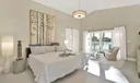 The Master Bedroom is Spacious and Opens to a Balcony with Breathtaking Views!