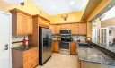 Kitchen with Baltic Brown countertops