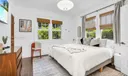 Primary king bedroom with newly updated designer en-suite bathroom.