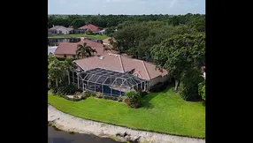 Lakefront Luxury in Northfork! Rare Custom Pool Home Hits the Market in Jupiter!