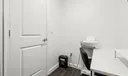 Office in primary room that was a walk in closet then converted to office