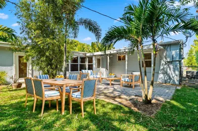 stylish dining and lounge furniture, all nestled w