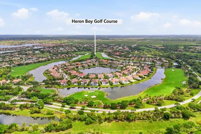 Walking distance to Heron Bay Golf Course.