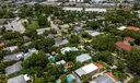 Aerial views of this exquisite villa with private guest house, pool and outdoor amenities to enjoy with family & friends.