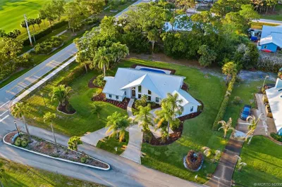 Half acre lot in highly desirable Palm City.